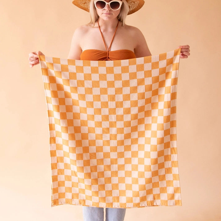 checker beach towel by Sunshine Studios