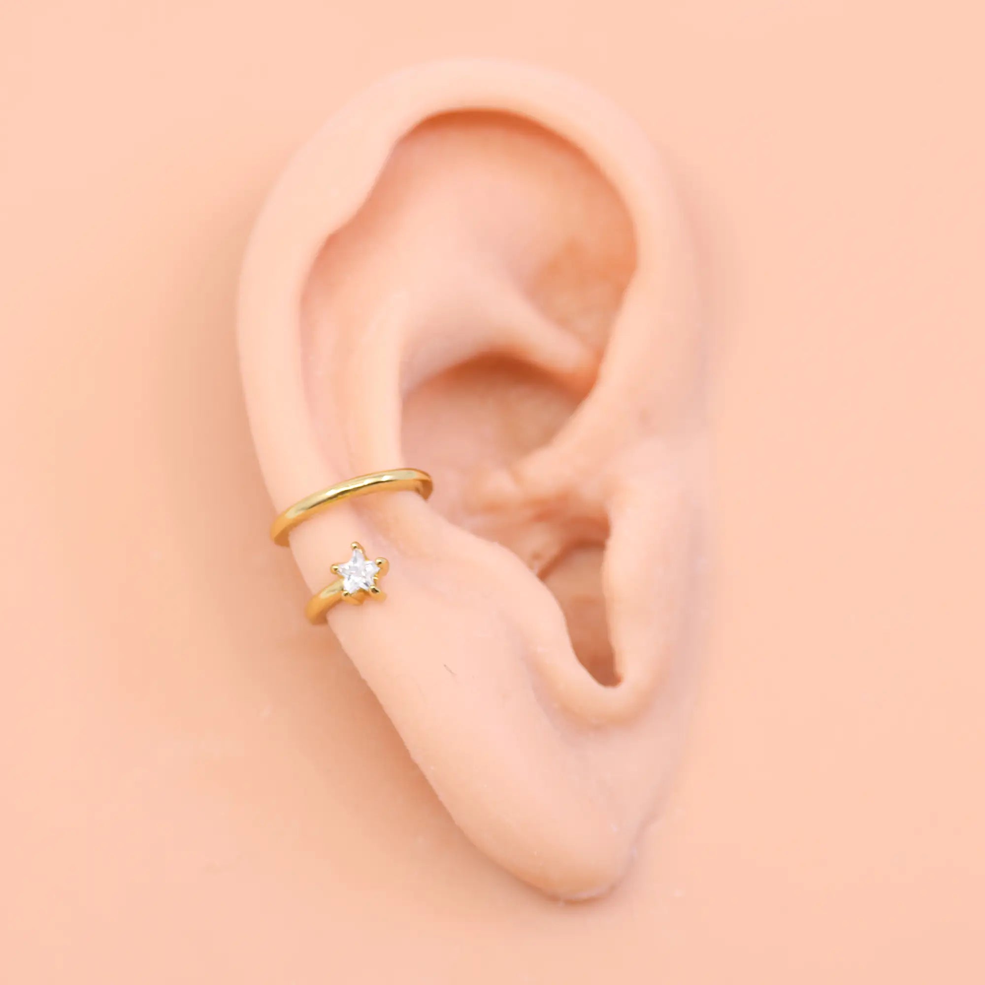 shooting star ear cuff in gold by land of salt